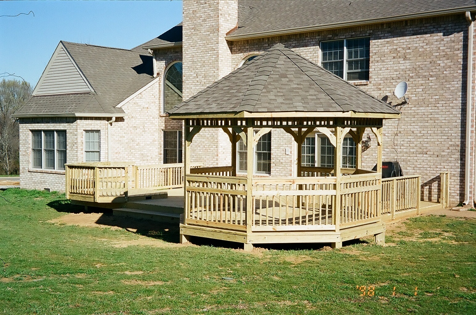 Deck installation featuring a gazebo and wooden deck at a home in Nashville, TN. A well-designed deck adds value to a property, enhancing outdoor living spaces for relaxation and entertainment.